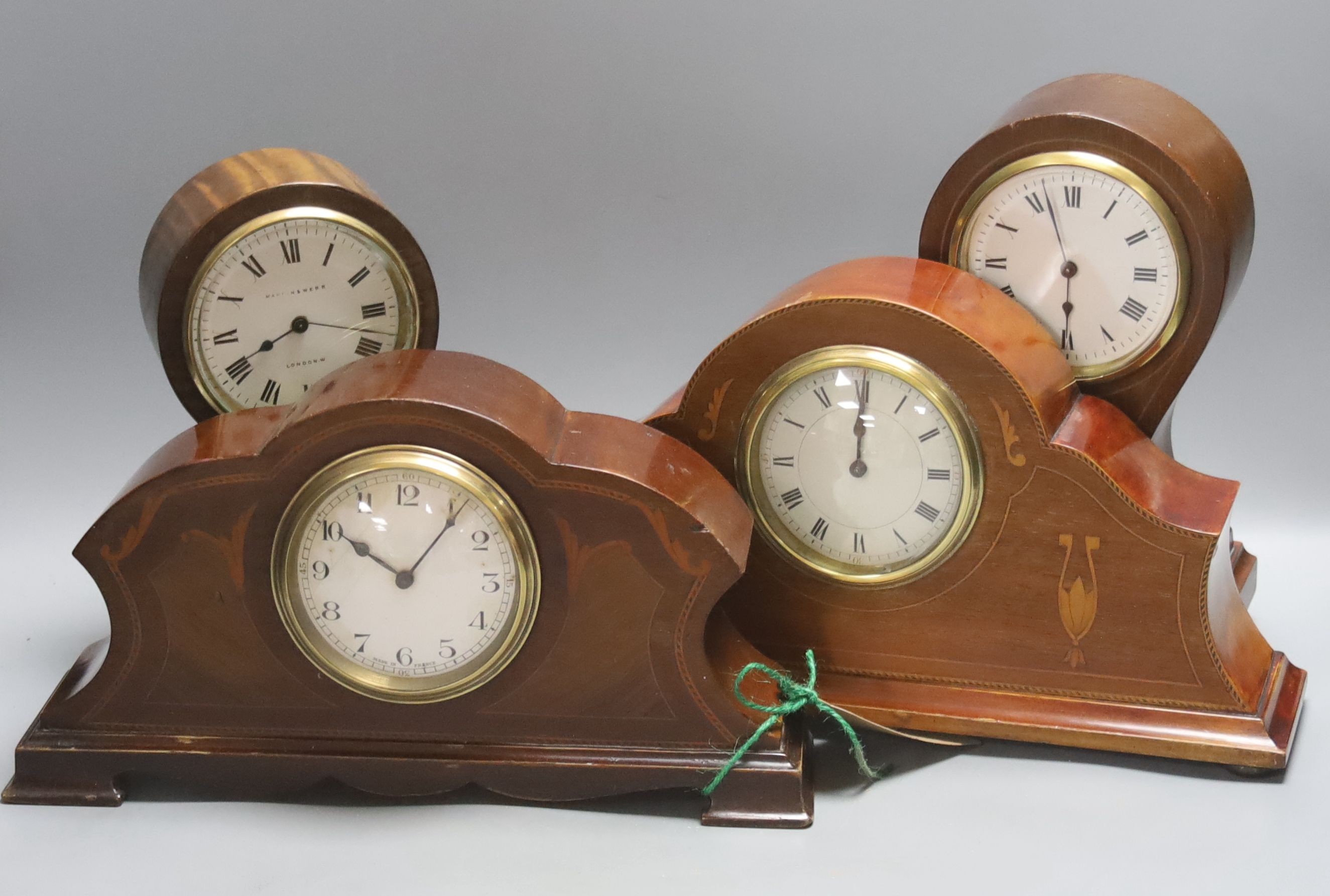 Four Edwardian inlaid mahogany mantel clocks, tallest 24cm